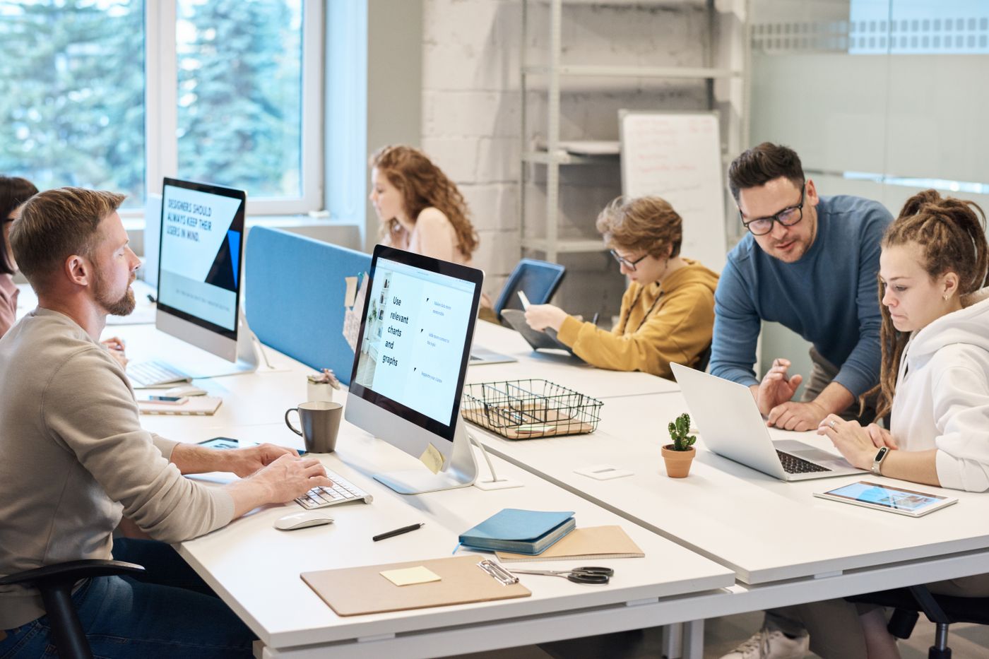Two members of the RemoteQuill team at work